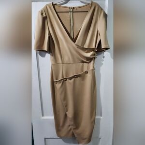 Elegant Asymmetrical Beige Dress with Button Details